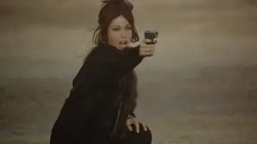 Backdrop to the movie "The Girl with a Pistol" #1097098