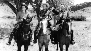 Backdrop to the movie "The Desperadoes" #1129436
