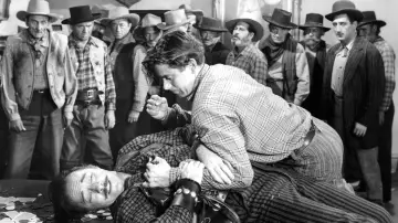 Backdrop to the movie "The Desperadoes" #1129438