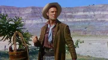 Backdrop to the movie "The Desperadoes" #1129444