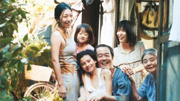 Backdrop to the movie "Shoplifters" #852871
