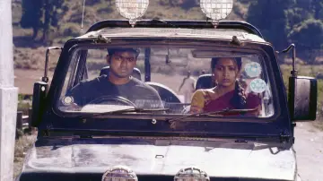 Backdrop to the movie "Ghilli" #1100812
