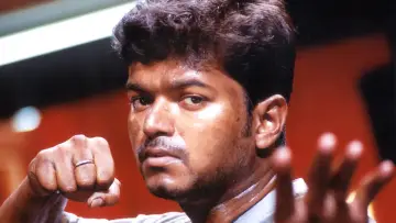 Backdrop to the movie "Ghilli" #1100833