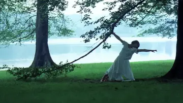 Backdrop to the movie "Women in Love" #1067590