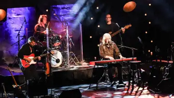 Backdrop to the movie "Arlo Guthrie - Alice’s Restaurant 50th Anniversary Concert With Arlo Guthrie" #1156810