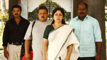 Backdrop to the movie "Oru Black & White Kudumbam" #1619428