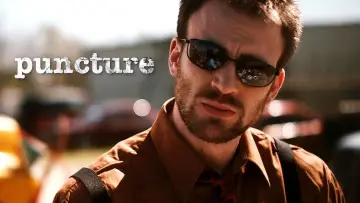 Backdrop to the movie "Puncture" #711537