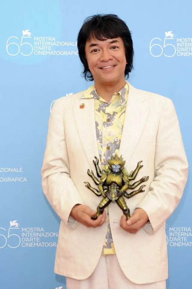 Photo Minoru Kawasaki