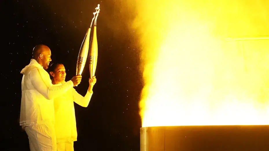 Video for the film Paris 2024 Olympic Opening Ceremony — JO PARIS 2024 - Marie-José Pérec et Teddy Riner allument ensemble la vasque olympique qui s'envole