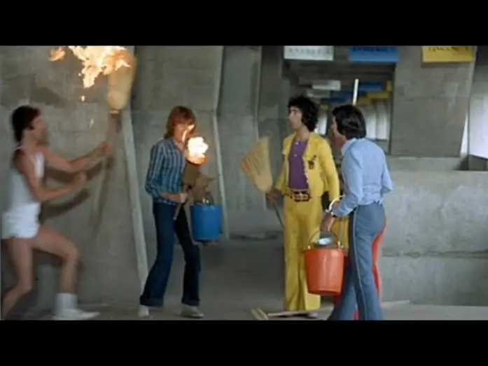 Video for the film Stadium Nuts — La flamme olympique et les Charlots dans "Les fous du Stade" - (2 extraits du film de 1972).
