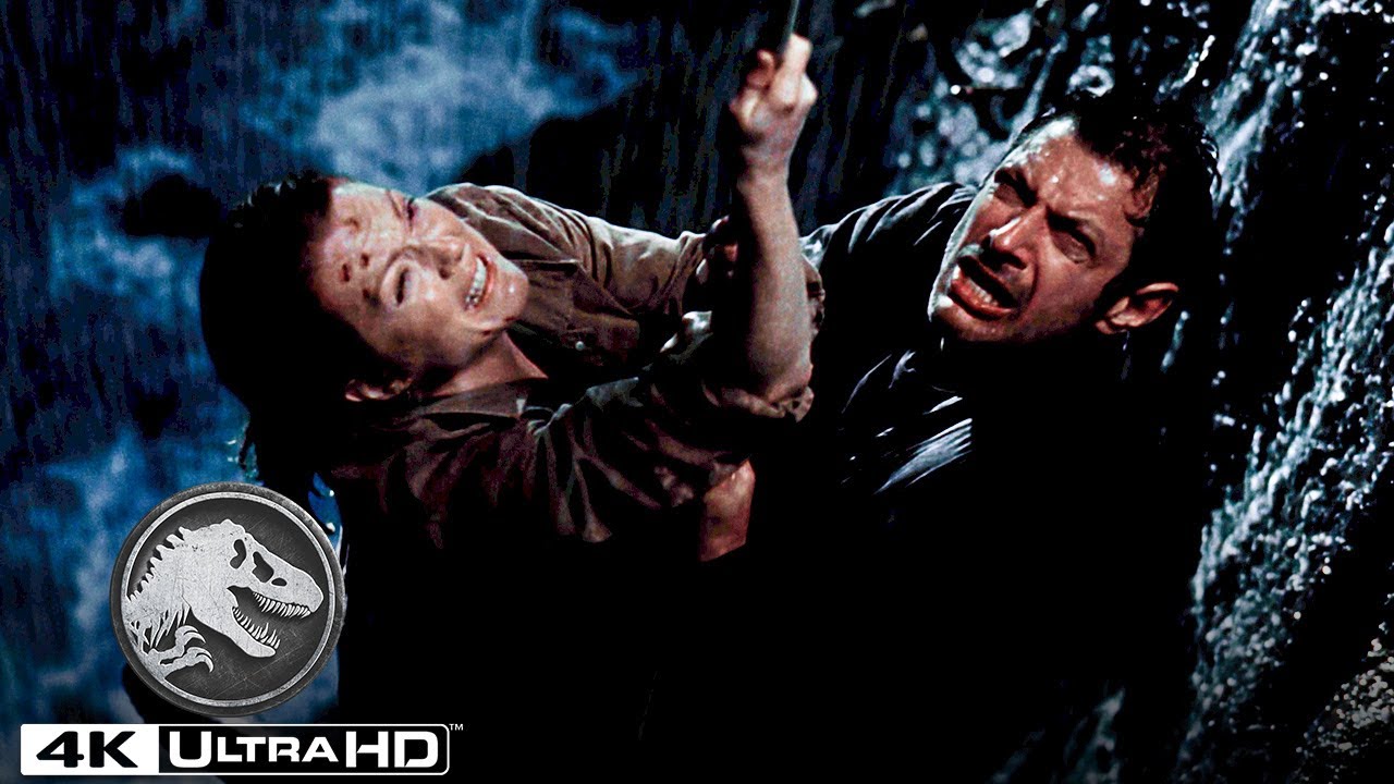 Video for the film The Lost World: Jurassic Park — A Family of T. Rexes Pushes Ian Malcolm Off of a Cliff