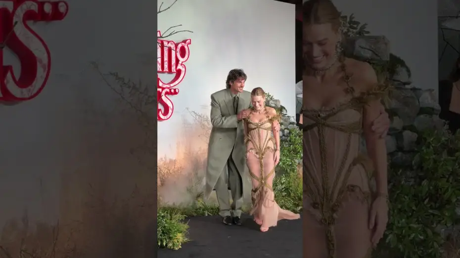 Video for the film “Wuthering Heights” — Margot Robbie & Jacob Elordi caught in the rain at the "WUTHERING HEIGHTS" UK Premiere