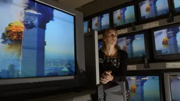 Backdrop for the TV series "9/11: One Day in America" #1671365
