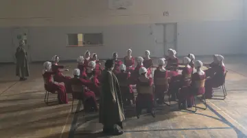 Backdrop for the TV series "The Handmaid